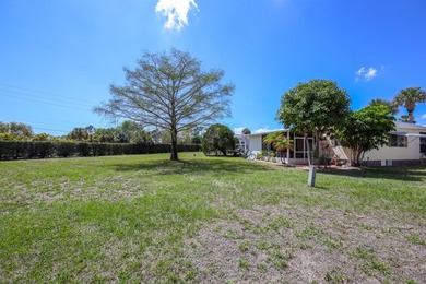 This smart SPLIT FLOOR PLAN, well maintained double wide on Maple Leaf Golf and Country Club in Florida - for sale on GolfHomes.com, golf home, golf lot