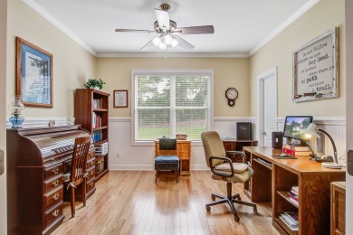 This custom Southern Living-style home sits on a tranquil pond on Santee National Golf Course in South Carolina - for sale on GolfHomes.com, golf home, golf lot