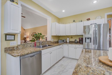 This custom Southern Living-style home sits on a tranquil pond on Santee National Golf Course in South Carolina - for sale on GolfHomes.com, golf home, golf lot