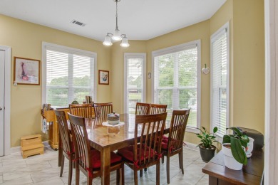 This custom Southern Living-style home sits on a tranquil pond on Santee National Golf Course in South Carolina - for sale on GolfHomes.com, golf home, golf lot