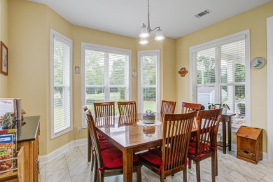 This custom Southern Living-style home sits on a tranquil pond on Santee National Golf Course in South Carolina - for sale on GolfHomes.com, golf home, golf lot