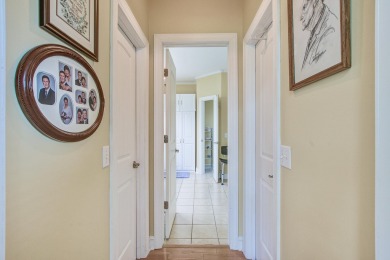 This custom Southern Living-style home sits on a tranquil pond on Santee National Golf Course in South Carolina - for sale on GolfHomes.com, golf home, golf lot