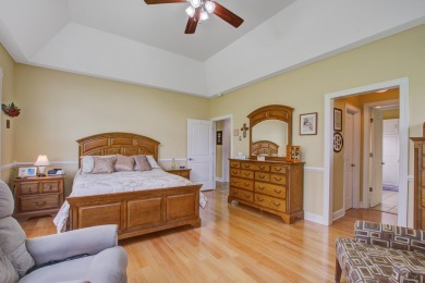 This custom Southern Living-style home sits on a tranquil pond on Santee National Golf Course in South Carolina - for sale on GolfHomes.com, golf home, golf lot