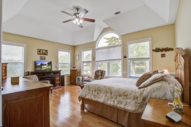 This custom Southern Living-style home sits on a tranquil pond on Santee National Golf Course in South Carolina - for sale on GolfHomes.com, golf home, golf lot