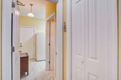 This custom Southern Living-style home sits on a tranquil pond on Santee National Golf Course in South Carolina - for sale on GolfHomes.com, golf home, golf lot