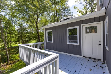 Welcome to your dream home on the 9th hole of a picturesque golf on The Hideout Golf in Pennsylvania - for sale on GolfHomes.com, golf home, golf lot