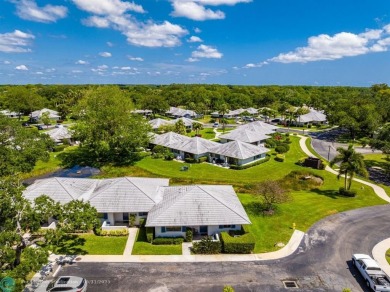 Welcome to this charming and updated 2-bedroom, 2-bathroom on PGA National Golf Club in Florida - for sale on GolfHomes.com, golf home, golf lot