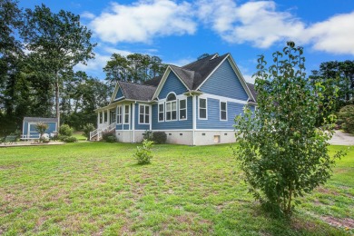 This custom Southern Living-style home sits on a tranquil pond on Santee National Golf Course in South Carolina - for sale on GolfHomes.com, golf home, golf lot