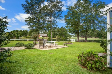 This custom Southern Living-style home sits on a tranquil pond on Santee National Golf Course in South Carolina - for sale on GolfHomes.com, golf home, golf lot