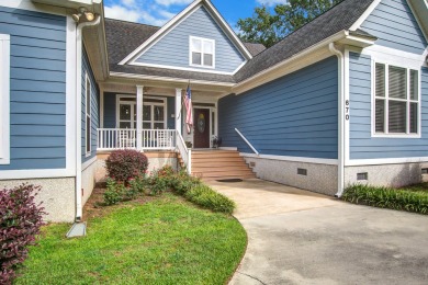 This custom Southern Living-style home sits on a tranquil pond on Santee National Golf Course in South Carolina - for sale on GolfHomes.com, golf home, golf lot