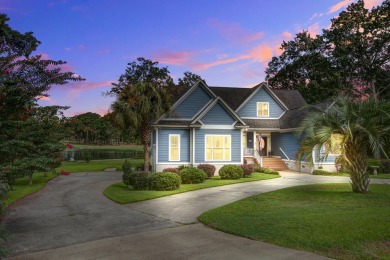 This custom Southern Living-style home sits on a tranquil pond on Santee National Golf Course in South Carolina - for sale on GolfHomes.com, golf home, golf lot