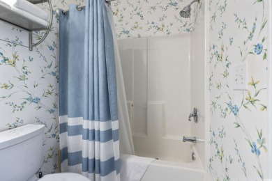 Welcome to your turnkey retreat at Barefoot Resort! This on  in South Carolina - for sale on GolfHomes.com, golf home, golf lot