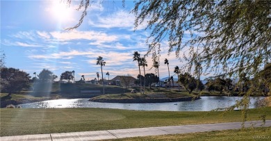 Gorgeous Golf Course Home. View of the pond and the lush green on Riverview Golf Course in Arizona - for sale on GolfHomes.com, golf home, golf lot