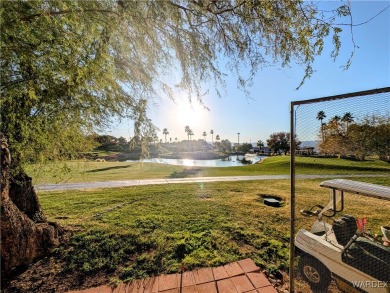 Gorgeous Golf Course Home. View of the pond and the lush green on Riverview Golf Course in Arizona - for sale on GolfHomes.com, golf home, golf lot