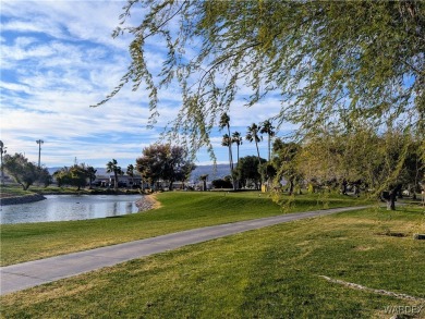 Gorgeous Golf Course Home. View of the pond and the lush green on Riverview Golf Course in Arizona - for sale on GolfHomes.com, golf home, golf lot