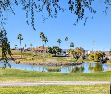 Gorgeous Golf Course Home. View of the pond and the lush green on Riverview Golf Course in Arizona - for sale on GolfHomes.com, golf home, golf lot