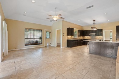 Private paradise nestled along the river with water views on Pecan Plantation Country Club in Texas - for sale on GolfHomes.com, golf home, golf lot