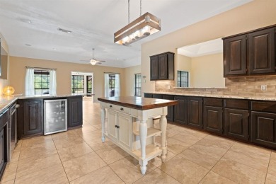 Private paradise nestled along the river with water views on Pecan Plantation Country Club in Texas - for sale on GolfHomes.com, golf home, golf lot