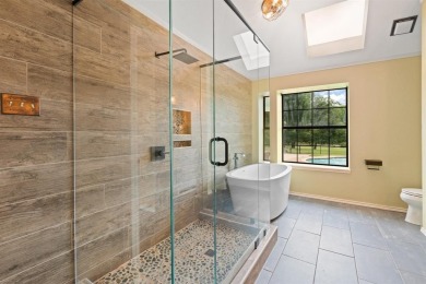 Private paradise nestled along the river with water views on Pecan Plantation Country Club in Texas - for sale on GolfHomes.com, golf home, golf lot