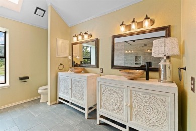 Private paradise nestled along the river with water views on Pecan Plantation Country Club in Texas - for sale on GolfHomes.com, golf home, golf lot