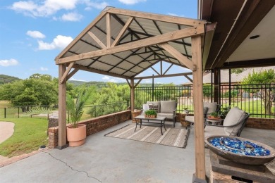 Private paradise nestled along the river with water views on Pecan Plantation Country Club in Texas - for sale on GolfHomes.com, golf home, golf lot