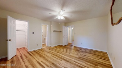 Inviting 3-Bedroom Brick Home with Sunroom Backing to the River on River Bend Golf and Country Club in North Carolina - for sale on GolfHomes.com, golf home, golf lot