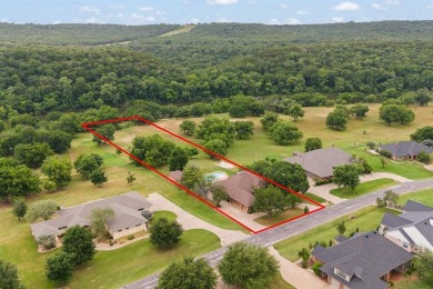 Private paradise nestled along the river with water views on Pecan Plantation Country Club in Texas - for sale on GolfHomes.com, golf home, golf lot