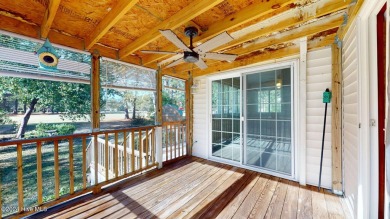 Inviting 3-Bedroom Brick Home with Sunroom Backing to the River on River Bend Golf and Country Club in North Carolina - for sale on GolfHomes.com, golf home, golf lot