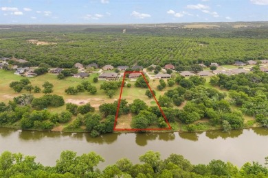 Private paradise nestled along the river with water views on Pecan Plantation Country Club in Texas - for sale on GolfHomes.com, golf home, golf lot