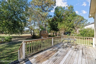 Inviting 3-Bedroom Brick Home with Sunroom Backing to the River on River Bend Golf and Country Club in North Carolina - for sale on GolfHomes.com, golf home, golf lot