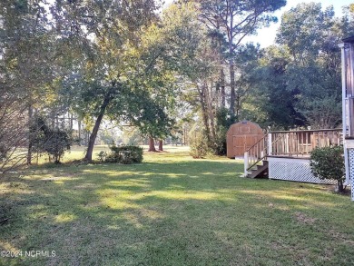 Inviting 3-Bedroom Brick Home with Sunroom Backing to the River on River Bend Golf and Country Club in North Carolina - for sale on GolfHomes.com, golf home, golf lot