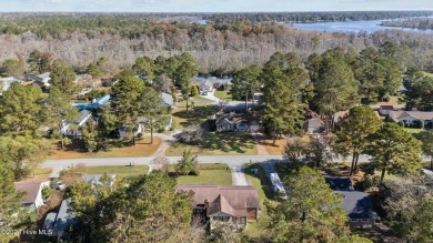 Inviting 3-Bedroom Brick Home with Sunroom Backing to the River on River Bend Golf and Country Club in North Carolina - for sale on GolfHomes.com, golf home, golf lot