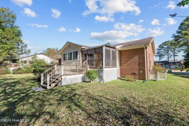 Inviting 3-Bedroom Brick Home with Sunroom Backing to the River on River Bend Golf and Country Club in North Carolina - for sale on GolfHomes.com, golf home, golf lot