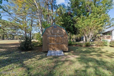 Inviting 3-Bedroom Brick Home with Sunroom Backing to the River on River Bend Golf and Country Club in North Carolina - for sale on GolfHomes.com, golf home, golf lot