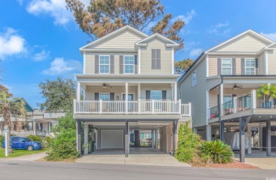 This very open and spacious 5-Bedroom, 5-Bath raised beach house on Prestwick Country Club in South Carolina - for sale on GolfHomes.com, golf home, golf lot