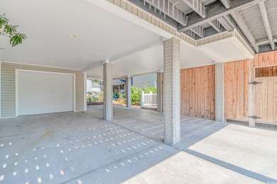 This very open and spacious 5-Bedroom, 5-Bath raised beach house on Prestwick Country Club in South Carolina - for sale on GolfHomes.com, golf home, golf lot