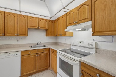 Enjoy peaceful living in this well-maintained 1-bedroom, 1 on Pembroke Lakes Golf Club in Florida - for sale on GolfHomes.com, golf home, golf lot