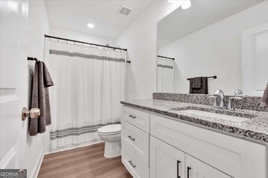 Discover the charm of this nearly new 2023 craftsman-style home on The Highlands Course at Lake Arrowhead in Georgia - for sale on GolfHomes.com, golf home, golf lot