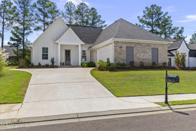 Welcome to this meticulously maintained 3-bedroom, 2-bath home on Lake Caroline Golf Club in Mississippi - for sale on GolfHomes.com, golf home, golf lot