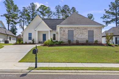 Welcome to this meticulously maintained 3-bedroom, 2-bath home on Lake Caroline Golf Club in Mississippi - for sale on GolfHomes.com, golf home, golf lot