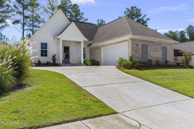 Welcome to this meticulously maintained 3-bedroom, 2-bath home on Lake Caroline Golf Club in Mississippi - for sale on GolfHomes.com, golf home, golf lot