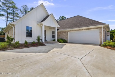 Welcome to this meticulously maintained 3-bedroom, 2-bath home on Lake Caroline Golf Club in Mississippi - for sale on GolfHomes.com, golf home, golf lot