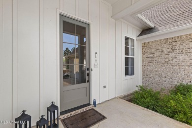 Welcome to this meticulously maintained 3-bedroom, 2-bath home on Lake Caroline Golf Club in Mississippi - for sale on GolfHomes.com, golf home, golf lot