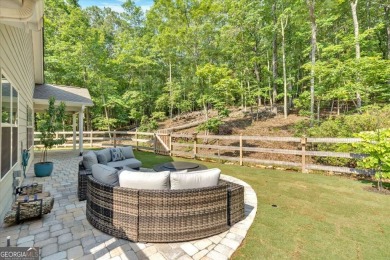Discover the charm of this nearly new 2023 craftsman-style home on The Highlands Course at Lake Arrowhead in Georgia - for sale on GolfHomes.com, golf home, golf lot