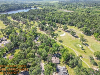 Nestled among the trees overlooking the 17th hole in the on Holly Lake Ranch Golf Club in Texas - for sale on GolfHomes.com, golf home, golf lot