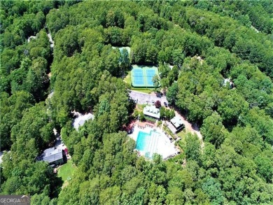 Discover the charm of this nearly new 2023 craftsman-style home on The Highlands Course at Lake Arrowhead in Georgia - for sale on GolfHomes.com, golf home, golf lot