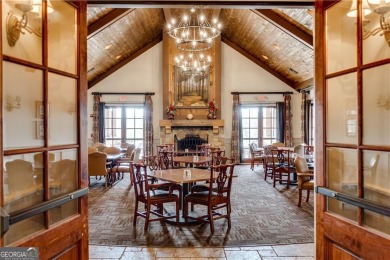 Discover the charm of this nearly new 2023 craftsman-style home on The Highlands Course at Lake Arrowhead in Georgia - for sale on GolfHomes.com, golf home, golf lot