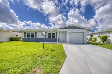 where over $50,000 in major upgrades--including hurricane impact on Cypress Lakes Golf Course - West Palm Beach in Florida - for sale on GolfHomes.com, golf home, golf lot