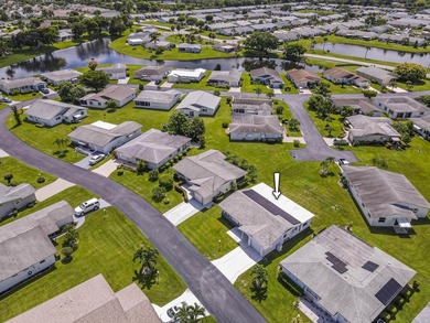where over $50,000 in major upgrades--including hurricane impact on Cypress Lakes Golf Course - West Palm Beach in Florida - for sale on GolfHomes.com, golf home, golf lot