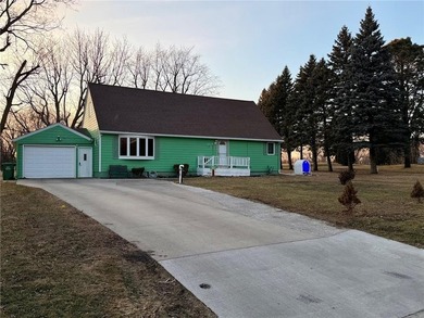 Enjoy golf-course living at its finest. Welcome to this inviting on Worthington Country Club in Minnesota - for sale on GolfHomes.com, golf home, golf lot